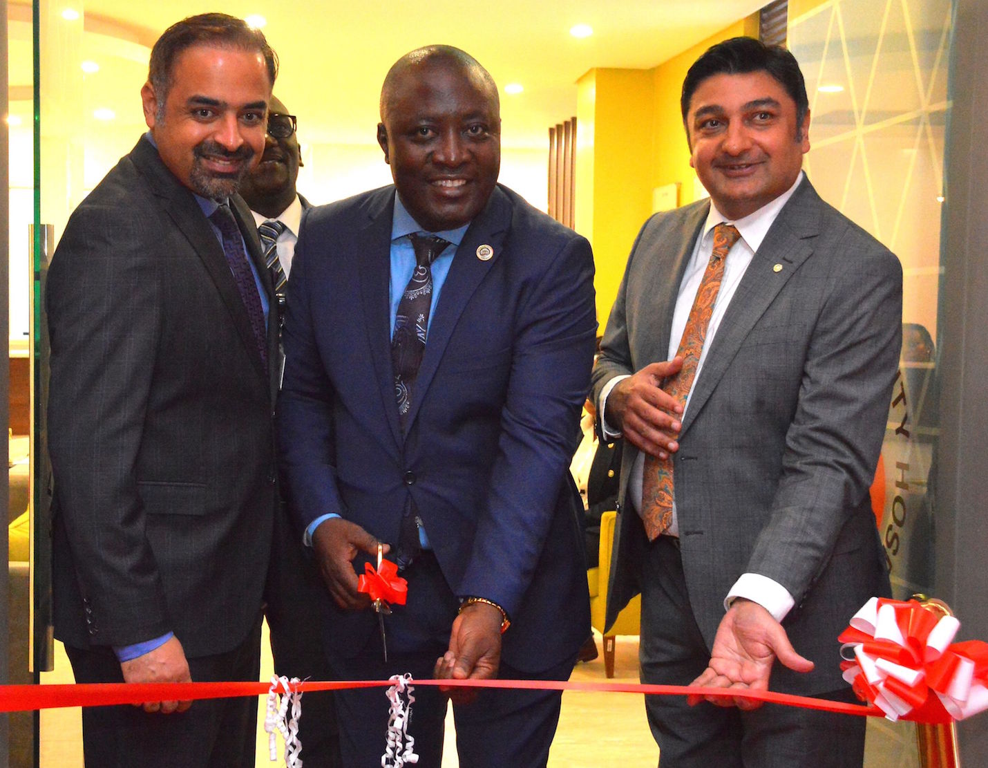 Nairobi County Ag. Secretary Patrick Analo officially opens the Karen Specialty and Executive Clinic. With him is the Aga Khan University Hospital CEO Rashid Khalani and COO of Outreach Network Khurram Jamal. The facility is part of the Aga Khan University Hospital’s strategy to bring specialized care closer to the community.