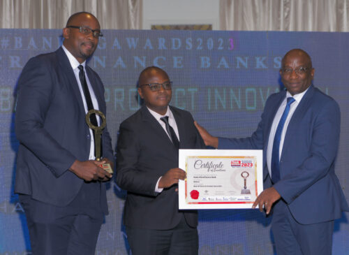 Faulu Bank, Senior Manager, Institutional Banking, Nicholas Akumu, and Product Development Manager Stephen Njuguna receive the 2023 Think Business Award for Best Microfinance Bank in Digital Banking from one of the awards Judges. The Bank was awarded for its unwavering commitment to leveraging technology and innovation to provide accessible and convenient financial solutions to customers.