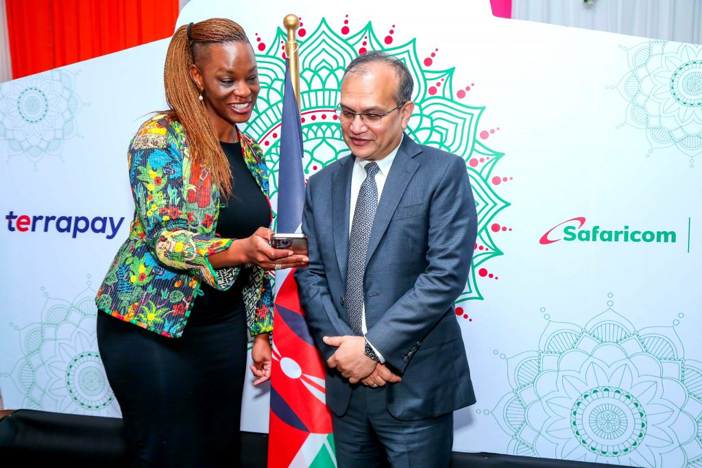 Esther Waititu(R) Chief Financial Services Officer Safaricom PLC pose for a photo with Ambar Sur(L) Founder & Chief Executive Officer TerraPay during the official launch of the partnership with TerraPay.By doing this more than 32 million M-PESA users would be able to send and receive money to more than 200 million people in Pakistan and Bangladesh. Michael Joseph Center in Nairobi, Kenya, served as the venue for the event.