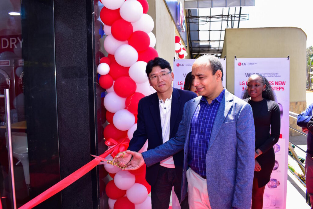 LG Electronics Home Appliance (HA) Product Manager Junho Seo is joined by Opalnet Managing Director Rakesh Singh in a ribbon-cutting ceremony to signify the launch of LG's first Smart Laundromat reference site. The inaugural LG Smart Laundromat reference site located at the T-Mall shopping mall in Langata, Nairobi, will act as a reference for investors seeking to venture into the laundromat business.