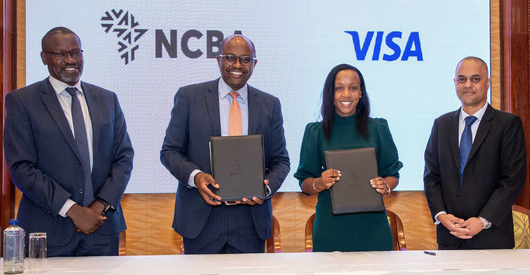 From Left: Charles Omondi-Group Director Corporate Banking NCBA , Tirus Mwithiga Group Director Retail Banking NCBA, Eva Ngigi Sarwari Ag General Manager Visa East Africa and Essop Imraan- Senior Director Head VISA Commercial Solution - Sub Saharan Africa (SSA) during the launch of Visa Spend Clarity for Enterprise for commercial card clients of NCBA .